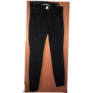 A black Route 66 skinny jeans in the size 10